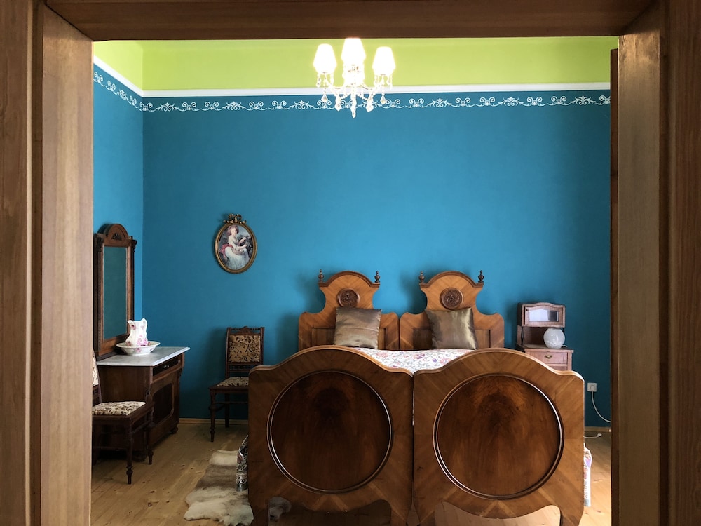 Royal Quadruple Room, 2 Queen Beds, Balcony, Garden View photo 1