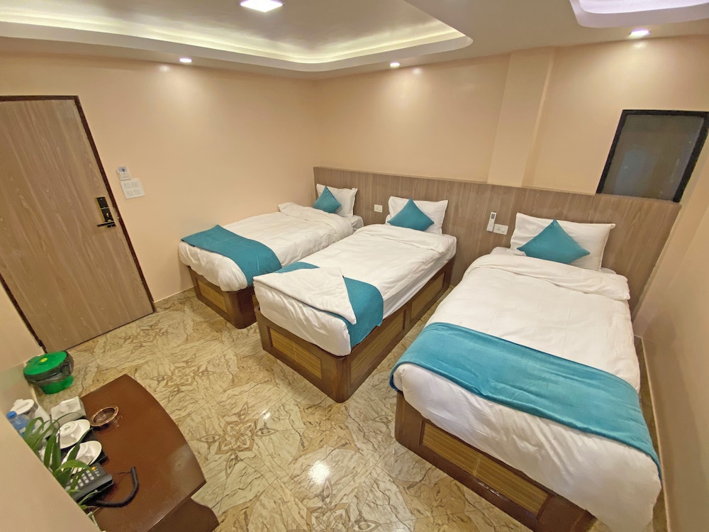 Deluxe Triple Room - Photo 15