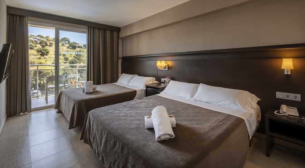 Habitación Familiar (2 Adultos + 2 Niños), Balcón