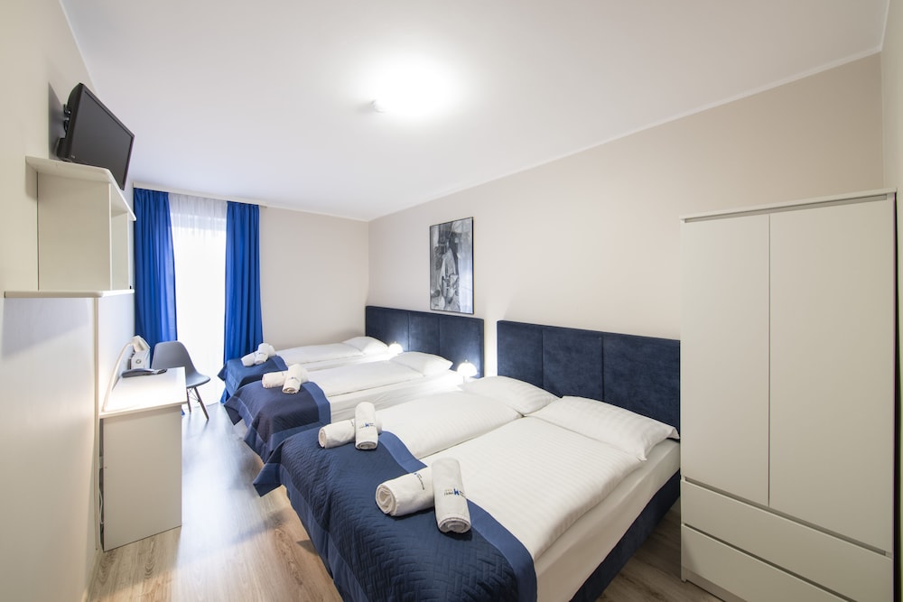 Family Quadruple Room, Multiple Beds - Photo 1