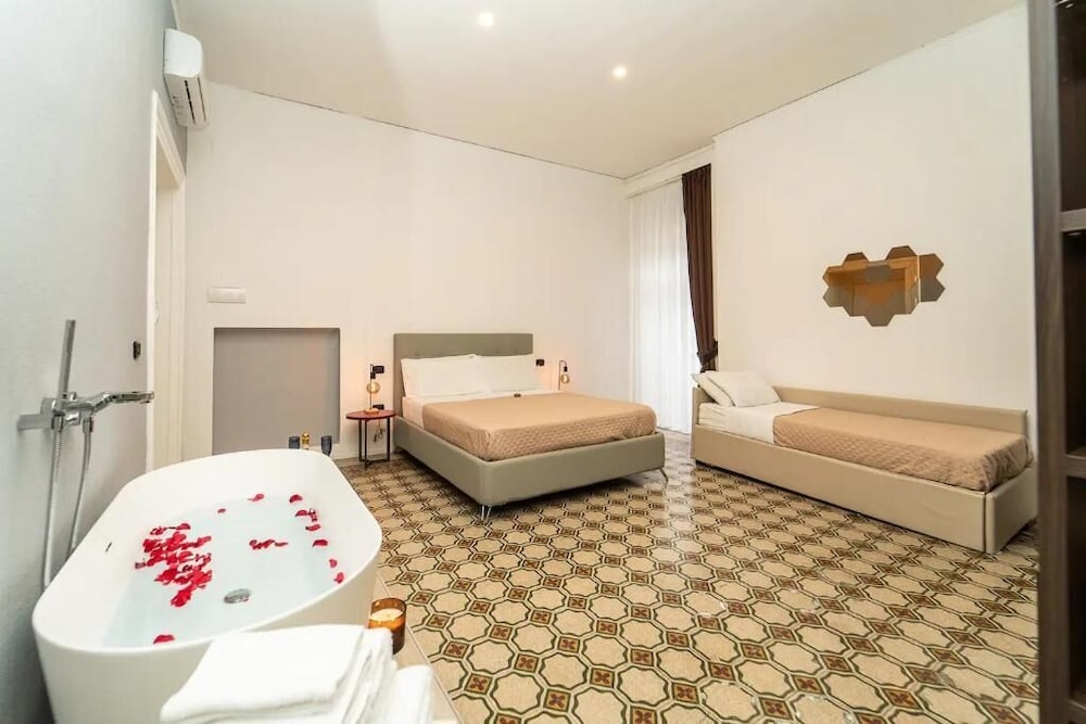 Deluxe Quadruple Room, Balcony, City View