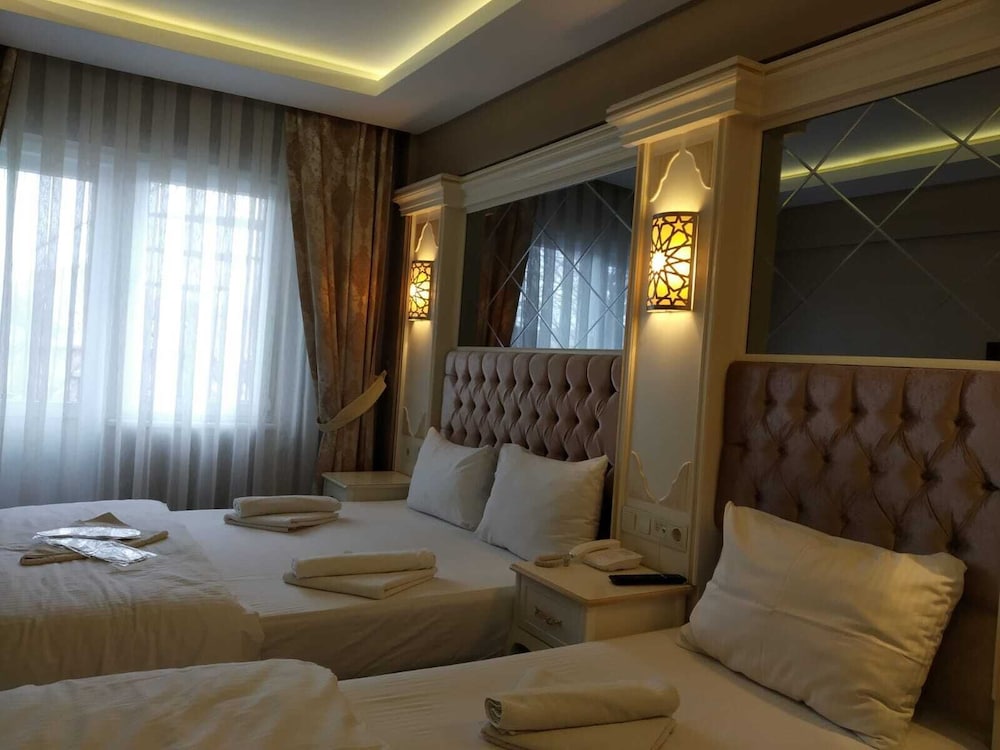 Deluxe Triple Room, 1 Bedroom, Non Smoking photo 1