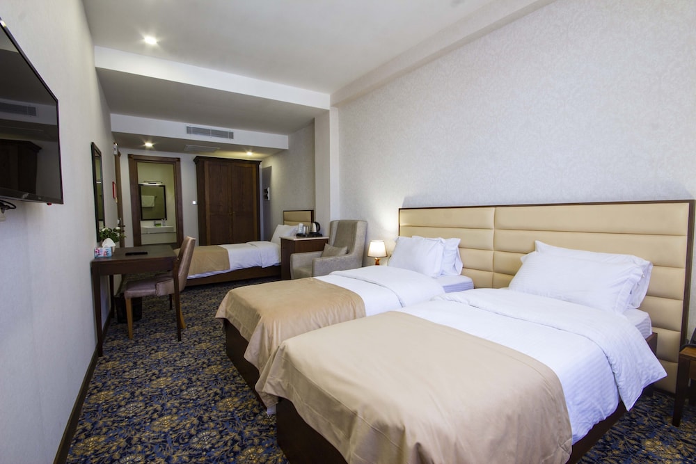 Superior Triple Room, City View