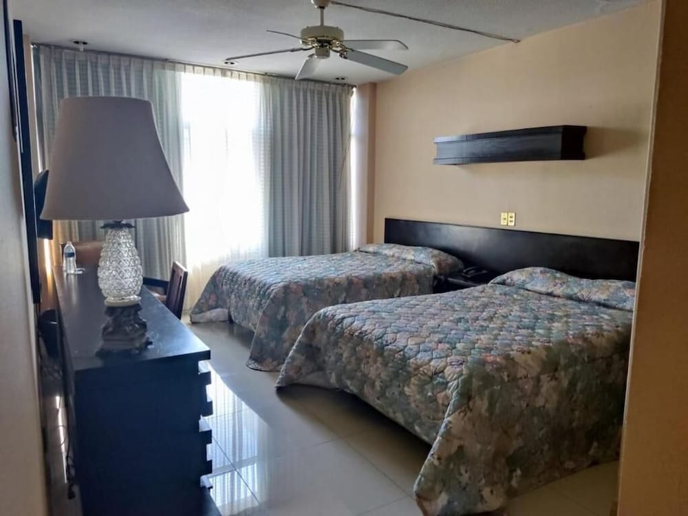 Traditional Quadruple Room, 2 Double Beds photo 1