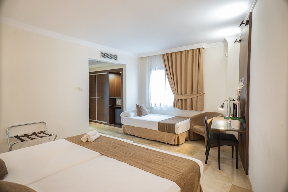 Triple Room - Photo 1
