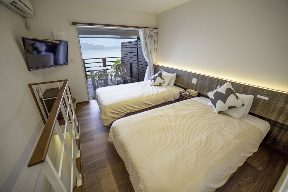 Comfort Room, Multiple Beds, Sea View, Beachside photo 2