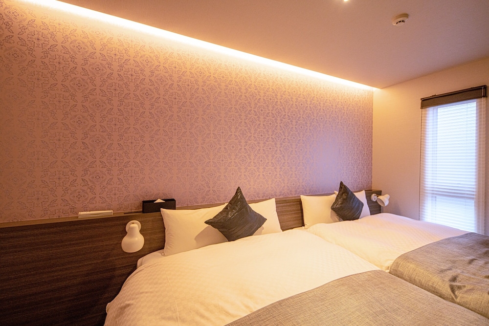 Quad Double Bed Suite - Photo 1