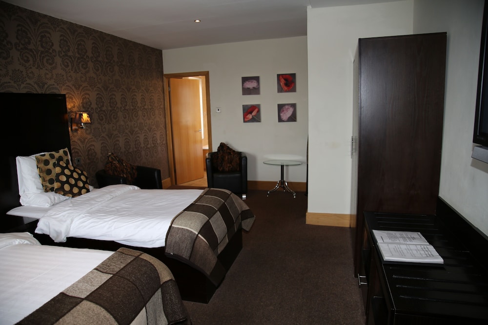 Deluxe Quadruple Room - Photo 6