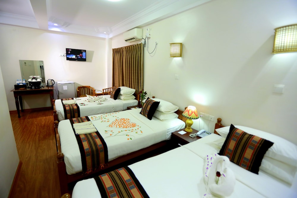 Grand Triple Room, 3 Bedrooms, Garden View photo 1
