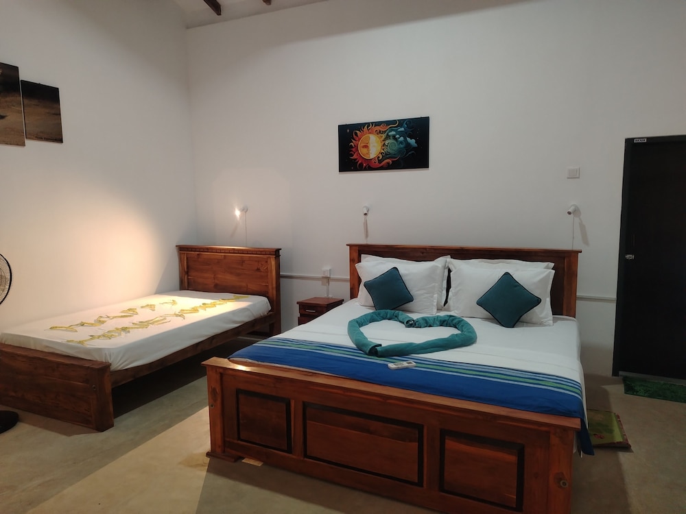 Deluxe Triple Room, Garden View photo 2