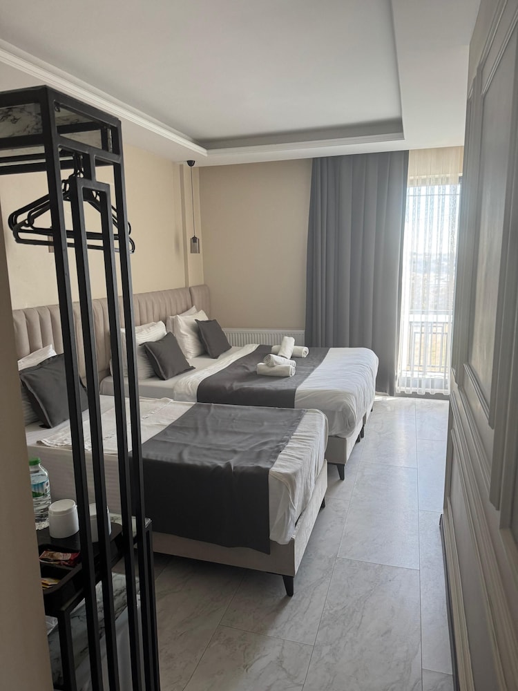 Deluxe Triple Room - Photo 6