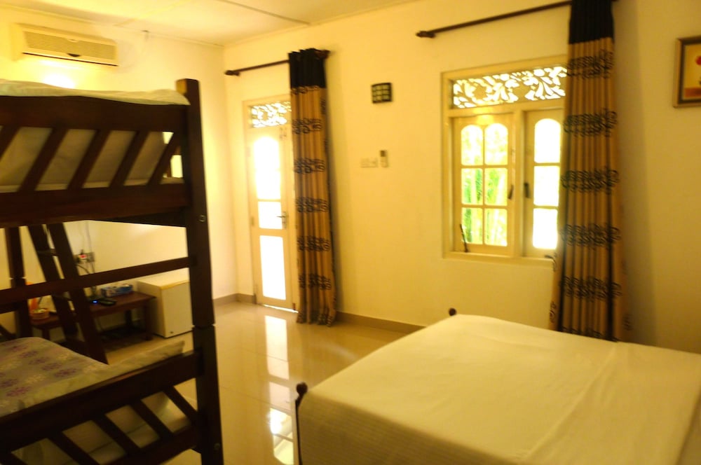 Standard Quadruple Room, 1 Bedroom, Garden View photo 2
