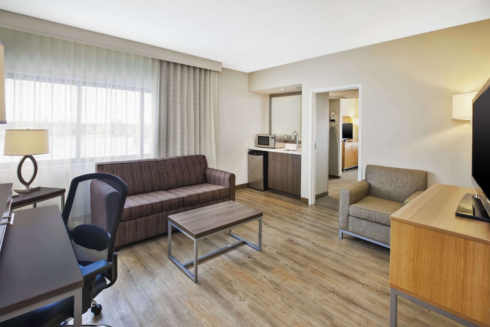Suite, 1 King Bed, Hearing Accessible at DoubleTree by Hilton Rapid City Downtown Convention Center in Rapid City