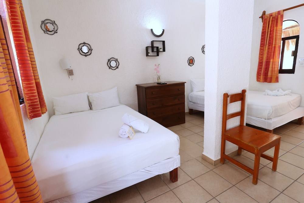 Coba 2 Double Beds with Balcony and Private Bathroom - Photo 1