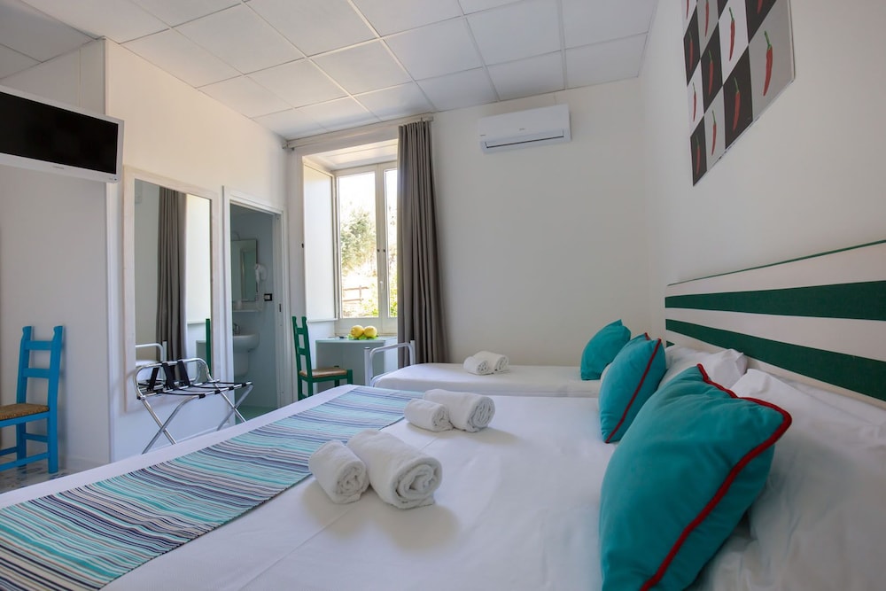 Standard Quadruple Room, Garden View - Photo 1