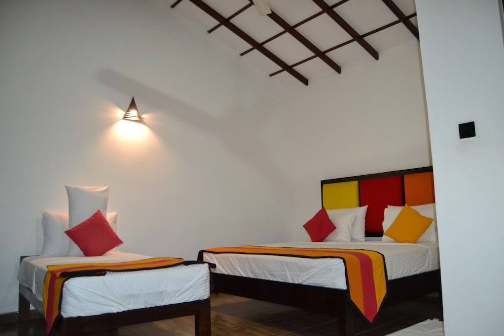 Deluxe Triple Room, 1 Bedroom, Garden View, Poolside photo 1