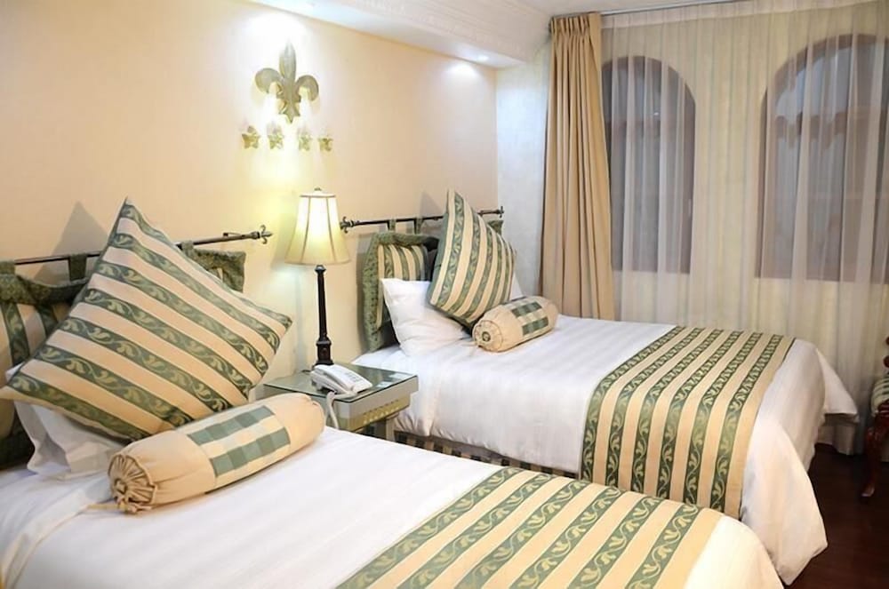 Quadruple Room, 2 Queen Beds, Private Bathroom photo 1