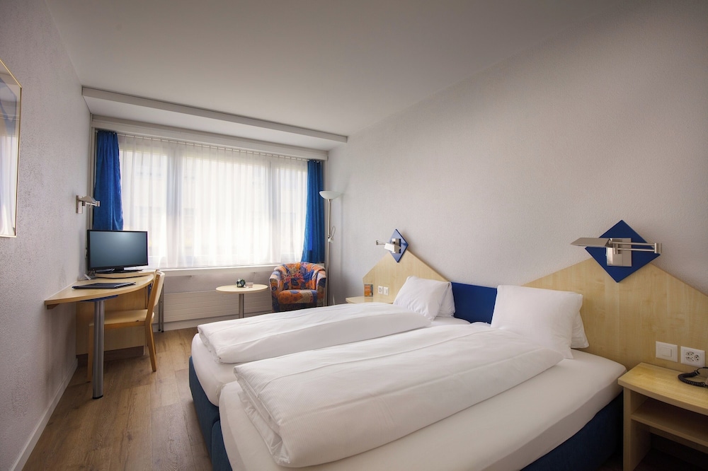 Comfort Quadruple Room, Courtyard View