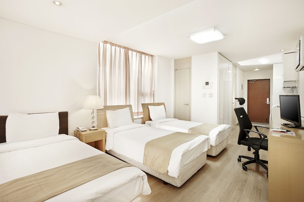 Deluxe Triple Room - Photo 1