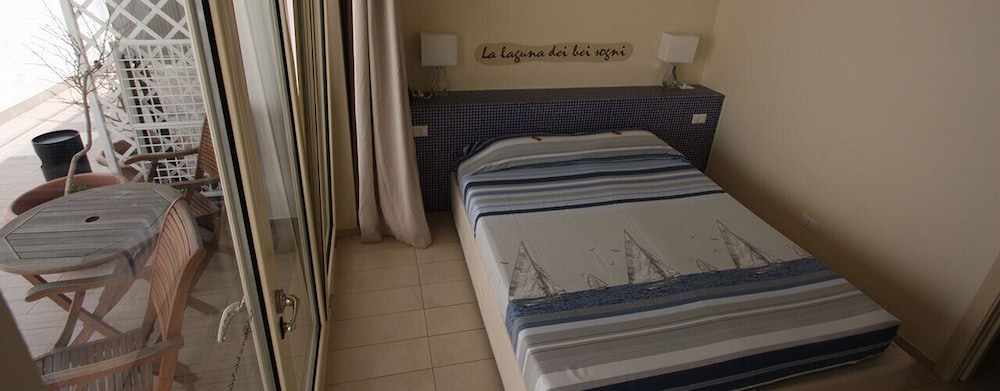 Basic Double Or Twin Room (La Laguna Dei Bei Sogni) photo 3