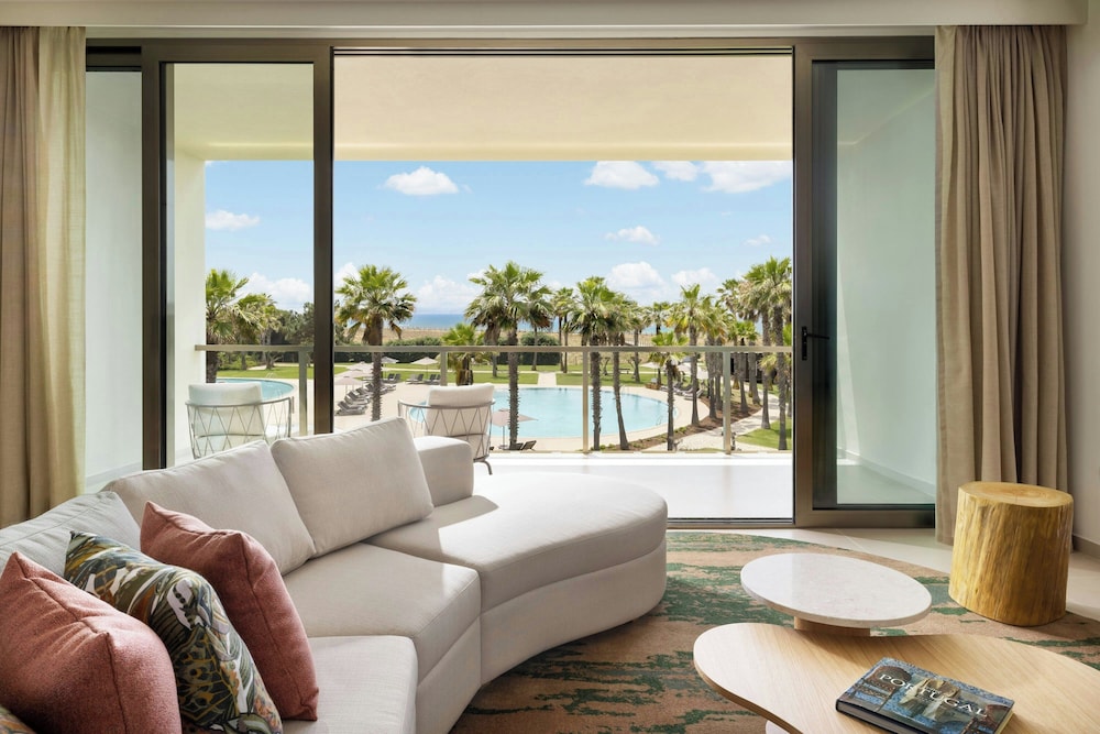Junior Suite, 1 King Bed with Sofa bed, Pool View - Photo 1