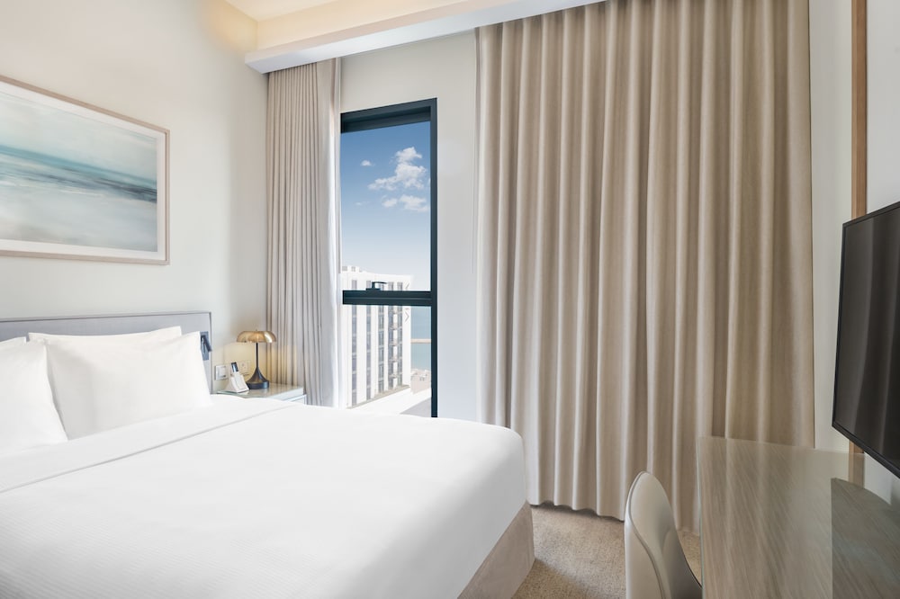 Deluxe Room, 1 King Bed, Partial Sea View - Photo 1