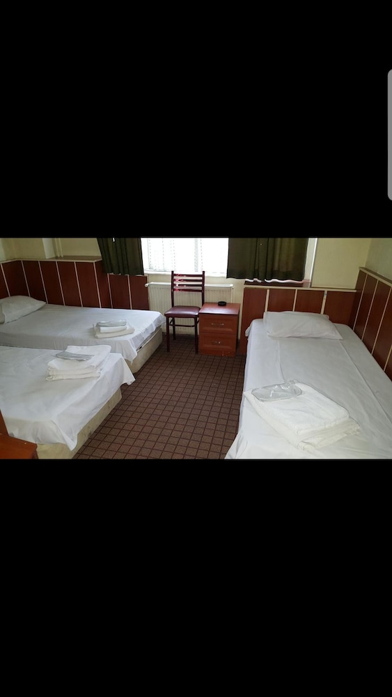 Economy Quadruple Room, City View photo 2