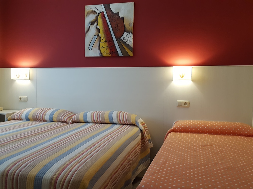 Habitación familiar (2 adultos + 1 niño)