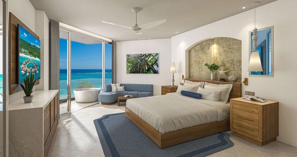 Chambre, 1 très grand lit, balcon, vue océan (Mammee Bay, Club Level)