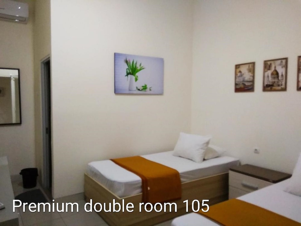 Standard Twin Room - Photo 4