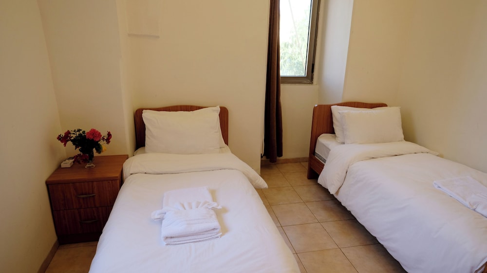 Two-Bedroom Apartment, (1 Double Bed + 2 Single Beds) photo 3