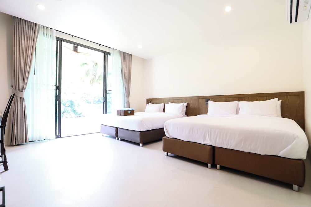 Deluxe Quadruple Room - Photo 14