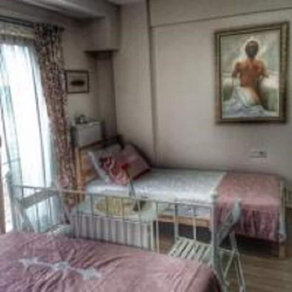 Deluxe Triple Room, Multiple Beds, Garden View photo 2