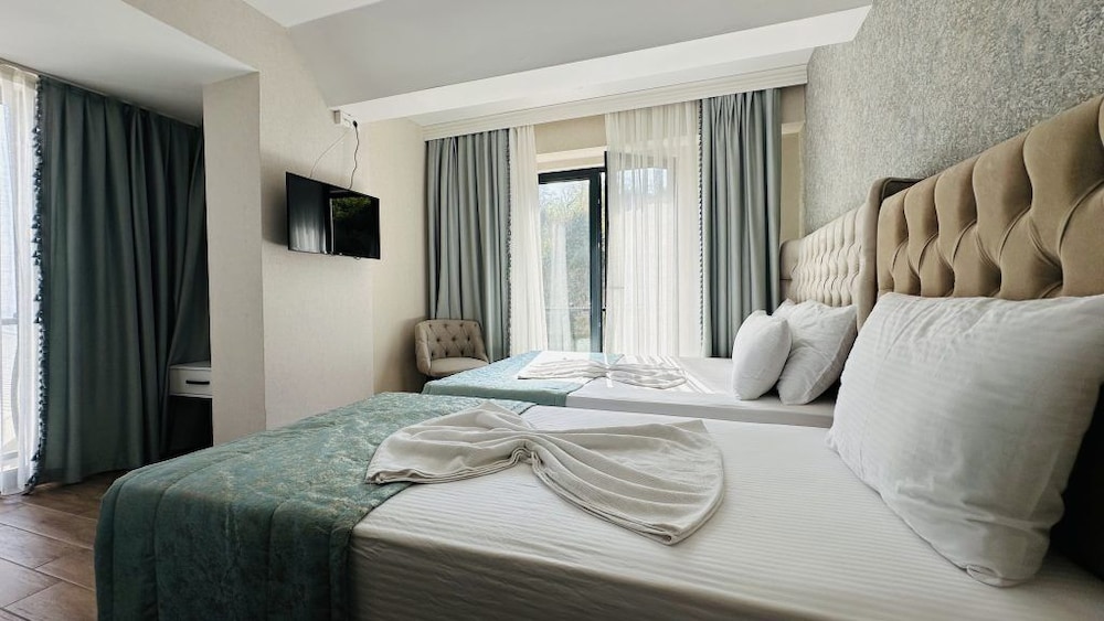 Standard Triple Room, Sea View photo 3