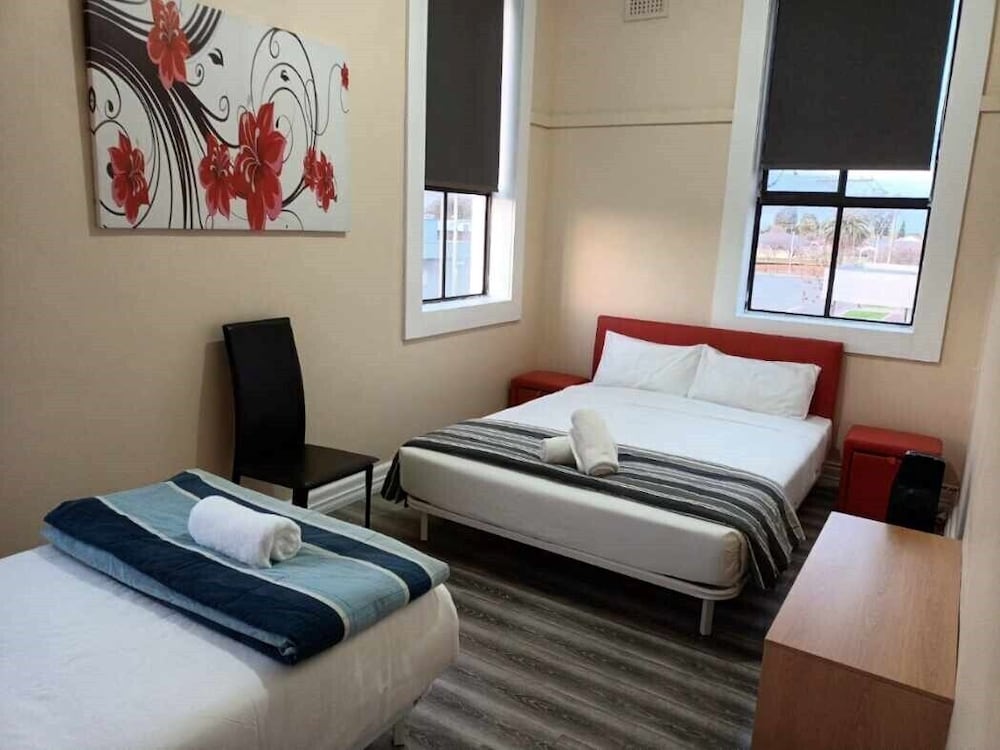 Economy Triple Room, Non Smoking, Shared Bathroom