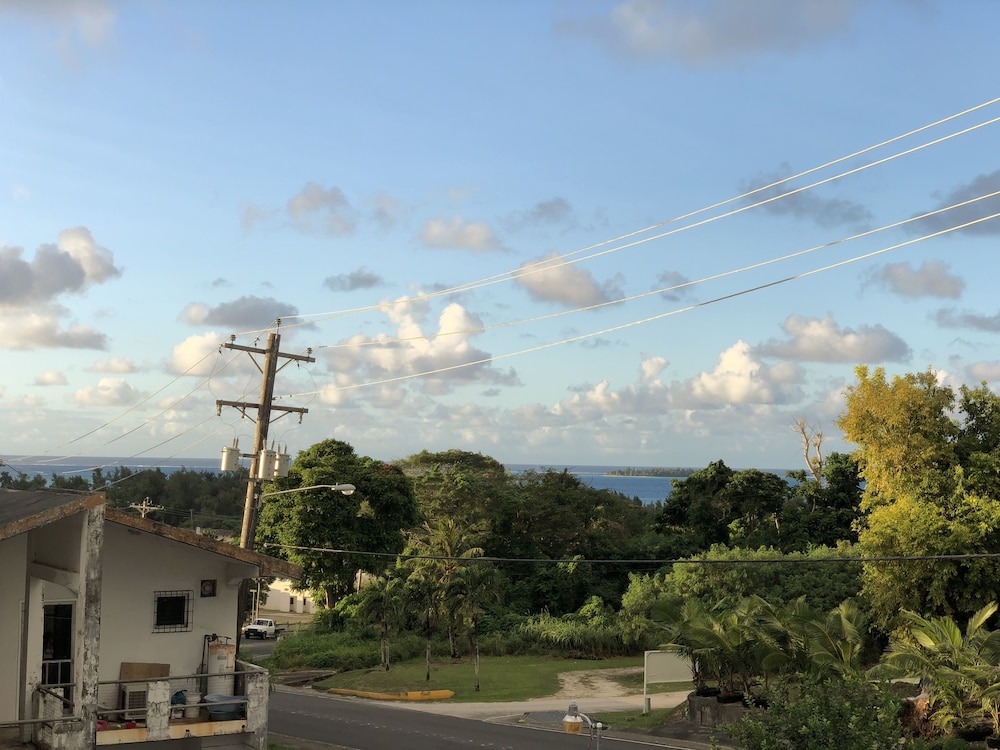 Basic Double Room, 2 Queen Beds, Non Smoking, Beach View photo 2