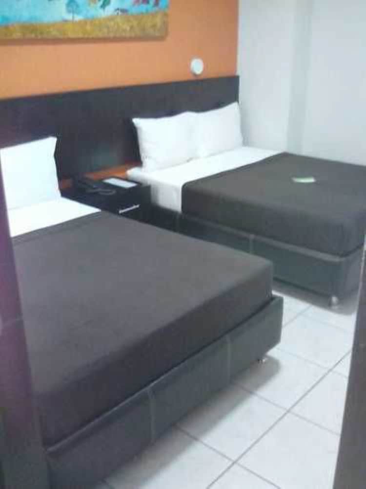 Basic Quadruple Room, 2 Double Beds - Photo 1