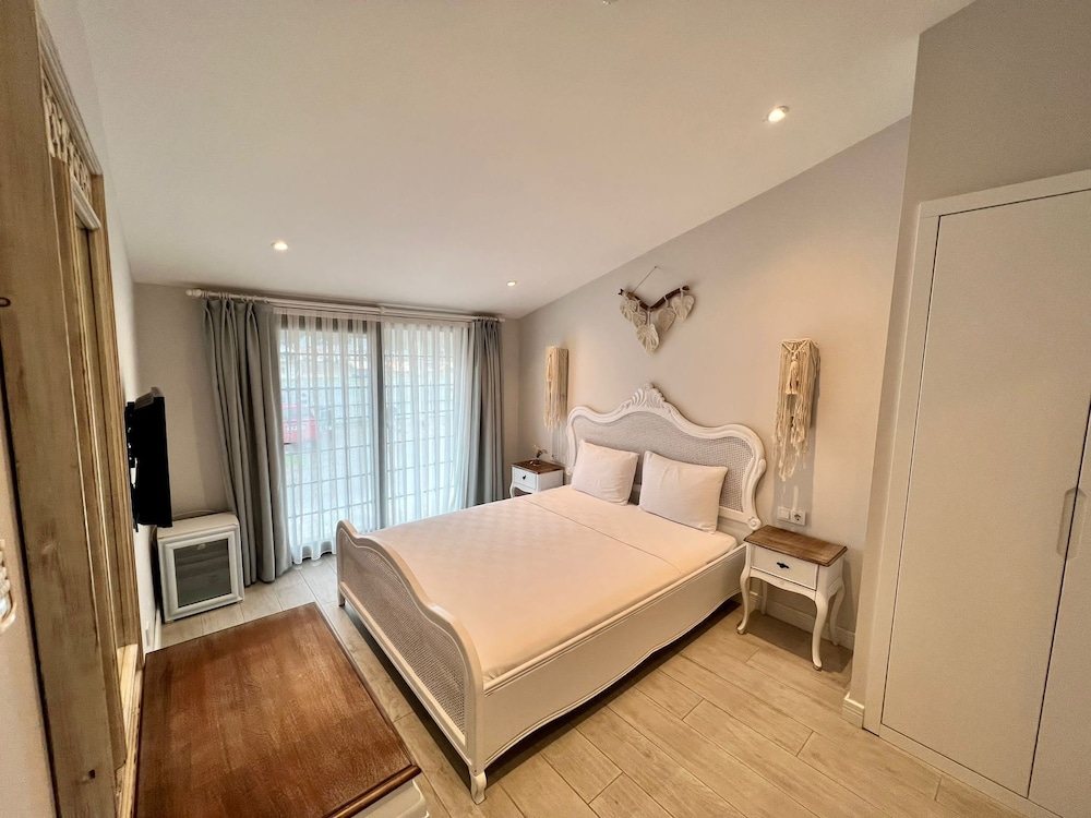 Standard Quadruple Room - Photo 8