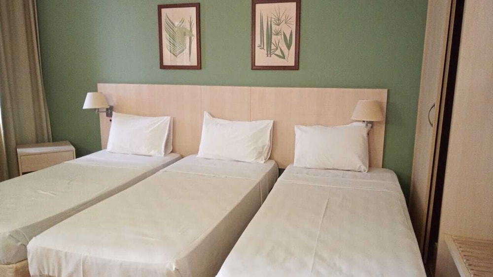 Apartamento triplo 3 camas de solteiro photo 1