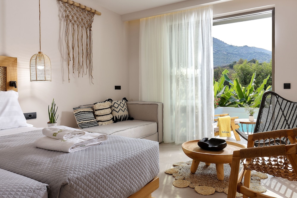 Junior Suite, Pool Access, Garden or Side Sea View