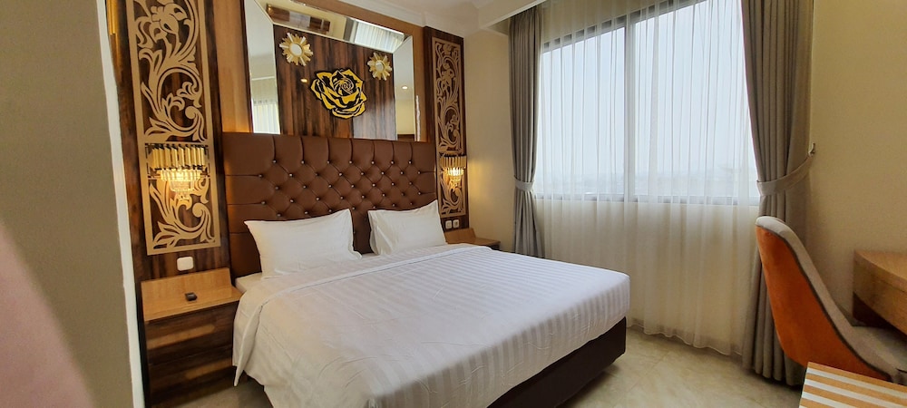 Deluxe Room - Photo 2