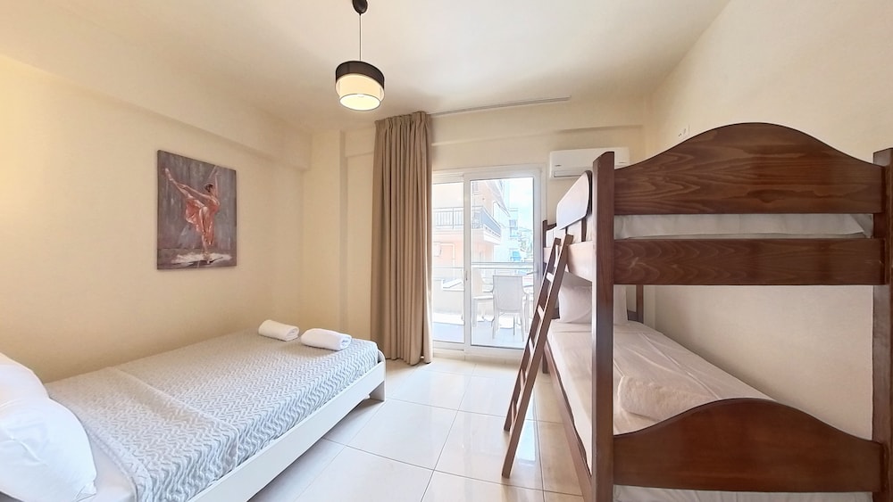 Economy Quadruple Room, Balcony, City View
