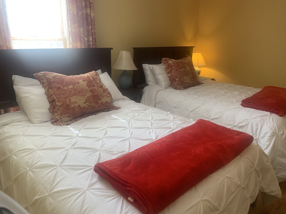 Deluxe Quadruple Room, 2 Queen Beds, Garden View photo 3