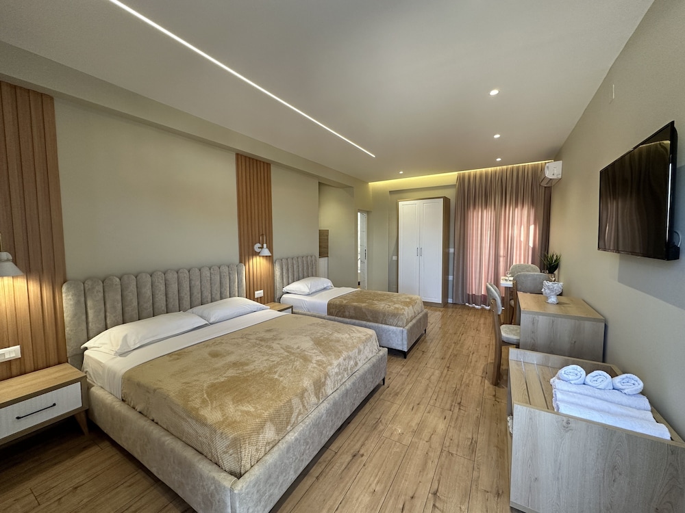 Billede 10 af Deluxe Triple Room, Balcony, Beachside