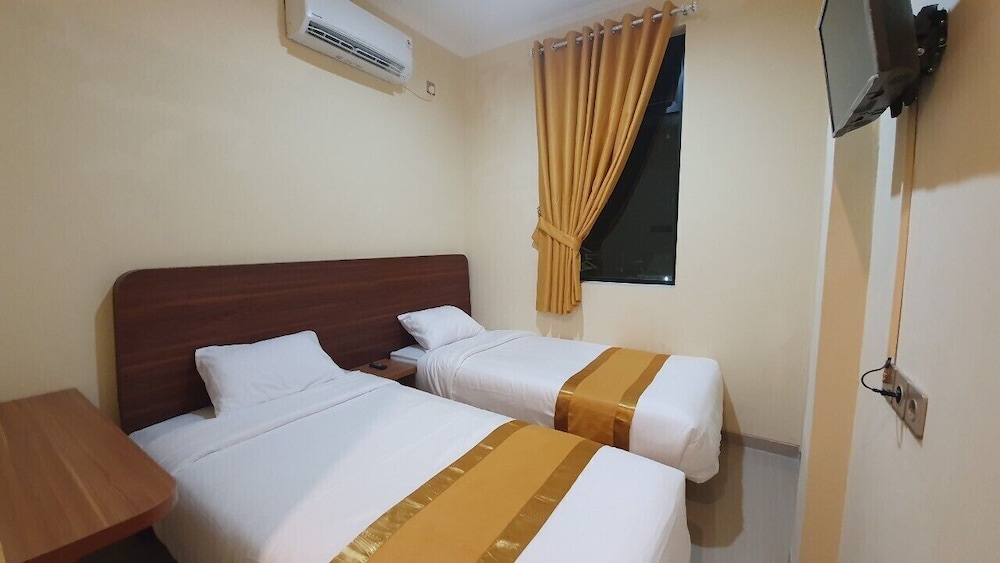 Standard Twin Room - Photo 1