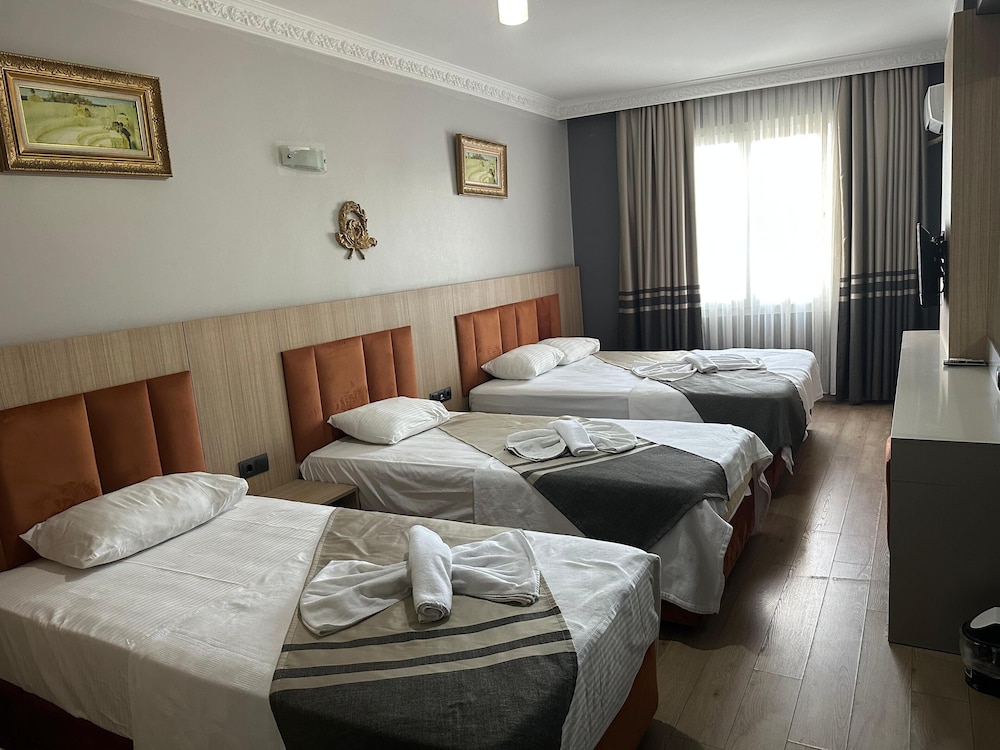 Triple Room - Photo 1