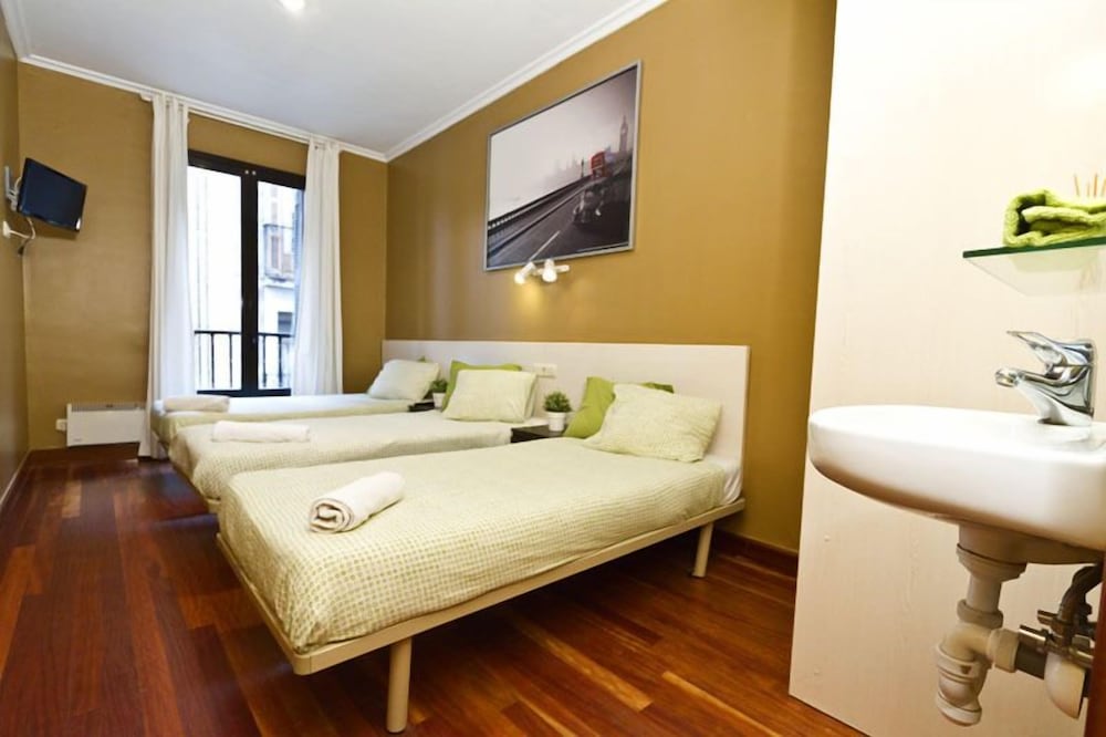 Habitación Triple, Baño Compartido