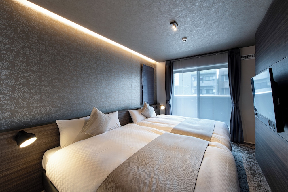 Quad Double Bed Suite - Photo 22