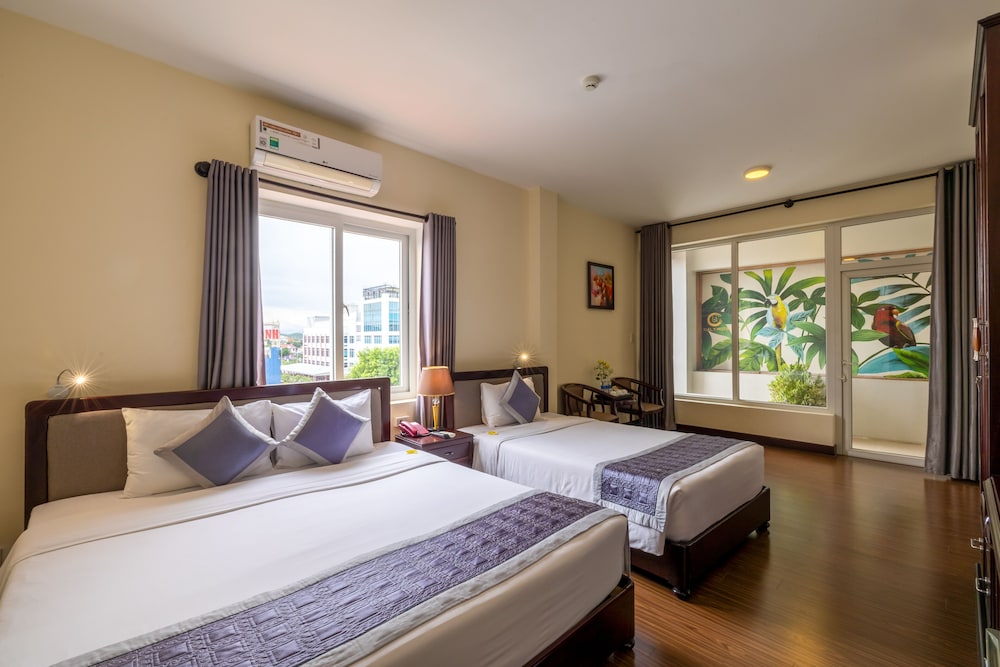 Deluxe Triple Room - Photo 1