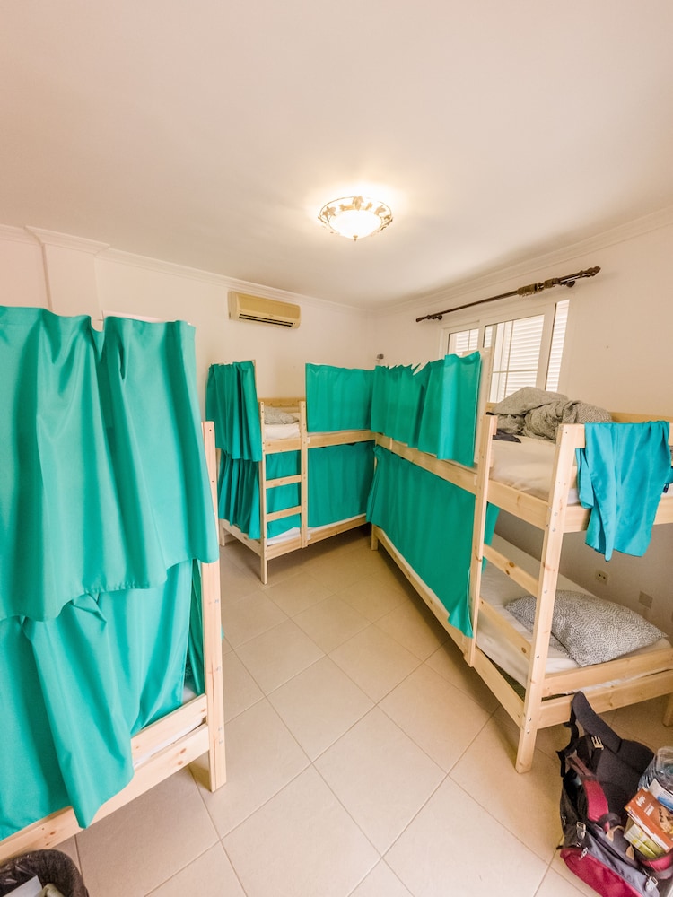 1 bed in a 10-bed FEMALE dormitory room with shared bathroom